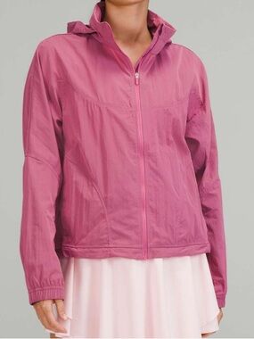 Lululemon Lightweight Hooded Jacket in a Pink Blossom color. Size 12